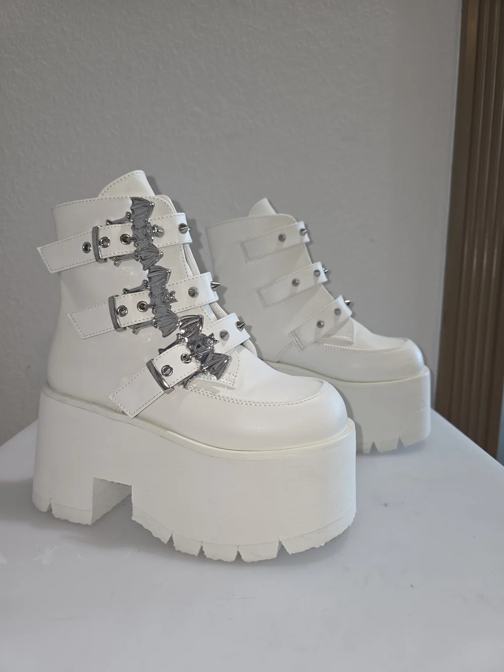 NWT Demonia white platform boots w silver buckles & spikes Sz 6